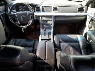 2009 Lincoln MKS with VIN 1LNHM94R59G611484, listed as a Copart auction lot 43998775 with 118,706 mi miles and Salvage Title. Bid and sale history available at DreamBid. Image 8.