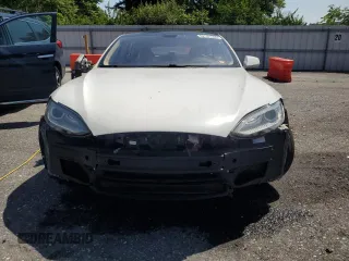 2013 Tesla Model S z VIN 5YJSA1DN0DFP18592, wystawiony jako Copart lot #62151505 z przebiegiem 192 283 mil mil oraz Szkoda całkowita • Salvage title. Historia ofert i sprzedaży dostępna na DreamBid. Obrazek 5.