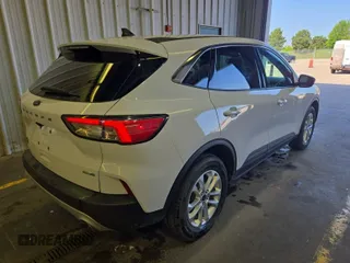 2020 Ford Escape SE with VIN 1FMCU9G63LUB82205, listed as a IAAI auction lot 42663574 with 91,305 mi miles and . Bid and sale history available at DreamBid. Image 10.