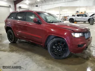 2021 Jeep Grand Cherokee Laredo X with VIN 1C4RJFAG4MC676572, listed as a Copart auction lot 52162605 with 112,437 mi miles and Salvage Title. Bid and sale history available at carsss.com. Image 4.
