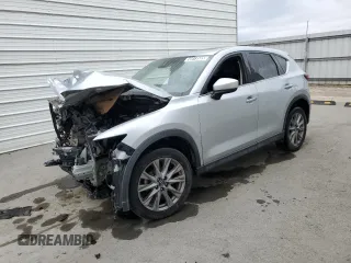 2021 Mazda CX-5 Grand Touring with VIN JM3KFADM7M1339081, listed as a Copart auction lot 58913585 with Not provided miles and Salvage title. Bid and sale history available at DreamBid. Image 1.
