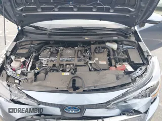 2022 Toyota Corolla Hybrid LE with VIN JTDEAMDE4NJ041913, listed as a IAAI auction lot 41883490 with 23,063 mi miles. Bid and sale history available at carsss.com. Image 10.