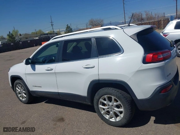 2014 Jeep Cherokee Latitude with VIN 1C4PJMCS4EW233979, listed as a IAAI auction lot 41976651 with 138,815 mi miles. Bid and sale history available at carsss.com. Image 14.