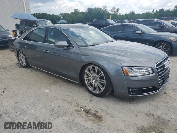 2015 Audi A8 4.0T with VIN WAU32AFD5FN040395, listed as a Copart auction lot 60909515 with 79,379 mi miles and Salvage title. Bid and sale history available at DreamBid. Image 4.