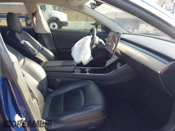 2018 Tesla Model 3 Long Range Battery with VIN 5YJ3E1EA4JF011799, listed as a IAAI auction lot 41765860 with 133,098 mi miles. Bid and sale history available at carsss.com. Image 5.