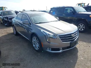 2019 Cadillac XTS Luxury with VIN 2G61M5S35K9125097, listed as a IAAI auction lot 41749076 with 102,585 mi miles. Bid and sale history available at carsss.com. Image 1.