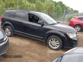 2015 Dodge Journey SXT z VIN 3C4PDCBGXFT711392, wystawiony jako IAAI lot #42530349 z przebiegiem 106 592 mil mil oraz . Historia ofert i sprzedaży dostępna na DreamBid. Obrazek 1.