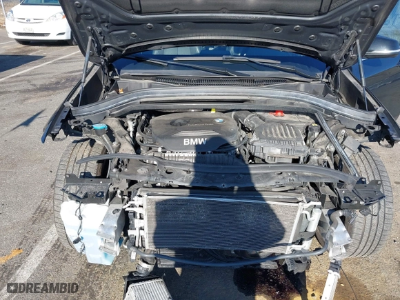 2018 BMW X1 xDrive28i with VIN WBXHT3C36J5F91110, listed as a IAAI auction lot 41757293 with 80,327 mi miles. Bid and sale history available at carsss.com. Image 10.