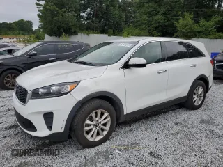 2019 Kia Sorento LX with VIN 5XYPG4A54KG482528, listed as a Copart auction lot 61601575 with 128,821 mi miles and Clean title. Bid and sale history available at DreamBid. Image 1.