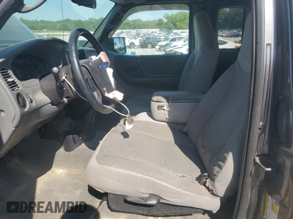 2011 Ford Ranger XLT with VIN 1FTKR4EE6BPB21913, listed as a Copart auction lot 55441215 with 159,970 mi miles and Salvage title. Bid and sale history available at DreamBid. Image 7.