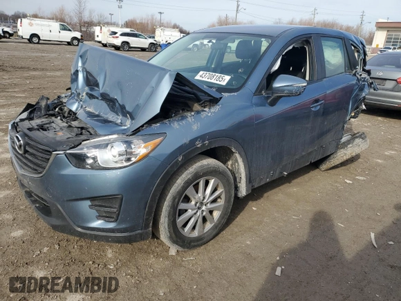 2016 Mazda CX-5 Sport with VIN JM3KE2BY0G0703866, listed as a Copart auction lot 43708185 with 186,790 mi miles and Salvage Title. Bid and sale history available at carsss.com. Image 1.