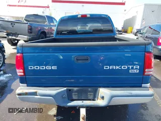 2003 Dodge Dakota SLT with VIN 1D7HL48N73S333828, listed as a IAAI auction lot 41748642 with 163,258 mi miles. Bid and sale history available at carsss.com. Image 16.