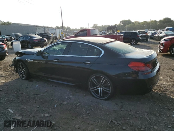 2013 BMW 6 Series 650i xDrive with VIN WBA6B4C57DDG67584, listed as a Copart auction lot 70319464 with 0 mi miles and Salvage Title. Bid and sale history available at carsss.com. Image 2.