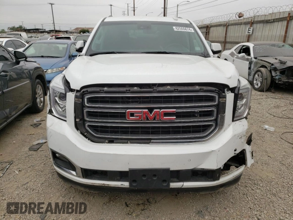 2017 GMC Yukon SLT with VIN 1GKS2BKC9HR125757, listed as a Copart auction lot 73427934 with 72,333 mi miles and Salvage Title. Bid and sale history available at carsss.com. Image 5.