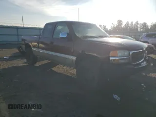 2000 GMC New Sierra 1500 SLE with VIN 1GTEK19V9YE210745, listed as a Copart auction lot 82035454 with 250,248 mi miles and Salvage Title. Bid and sale history available at carsss.com. Image 4.