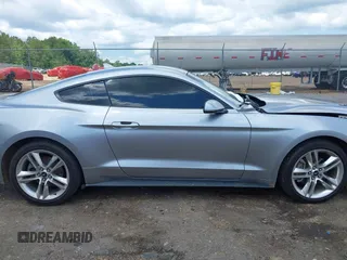2021 Ford Mustang EcoBoost z VIN 1FA6P8TH1M5121107, wystawiony jako IAAI lot #42204097 z przebiegiem 51 542 mil mil oraz . Historia ofert i sprzedaży dostępna na DreamBid. Obrazek 13.