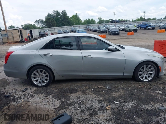 2014 Cadillac CTS Luxury RWD z VIN 1G6AR5S38E0173628, wystawiony jako IAAI lot #42343647 z przebiegiem 166 035 mil mil oraz . Historia ofert i sprzedaży dostępna na DreamBid. Obrazek 13.