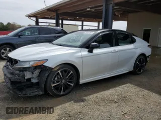 2019 Toyota Camry XSE with VIN 4T1B61HK1KU277900, listed as a Copart auction lot 50334865 with 122,154 mi miles and Salvage Title. Bid and sale history available at carsss.com. Image 1.