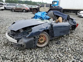 2000 Porsche Boxster S with VIN WP0CB2980YU660930, listed as a Copart auction lot 61270324 with 0 mi miles and Salvage Title. Bid and sale history available at carsss.com. Image 1.