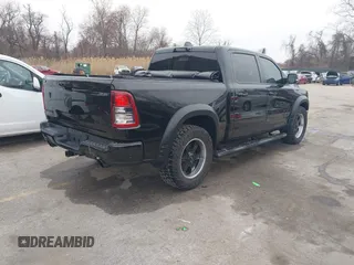 2022 Ram 1500 Big Horn with VIN 1C6SRFFT3NN287385, listed as a IAAI auction lot 41793596 with 12,277 mi miles and . Bid and sale history available at DreamBid. Image 4.