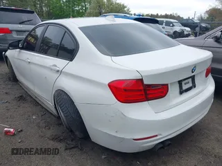 2014 BMW 3 Series 328i xDrive with VIN WBA3B5C56EP544400, listed as a IAAI auction lot 42172100 with 242,472 mi miles. Bid and sale history available at carsss.com. Image 3.