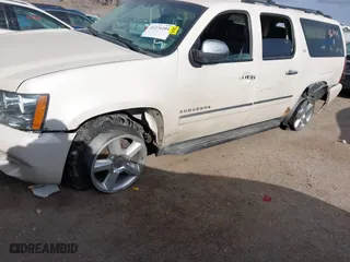 2012 Chevrolet Suburban LTZ with VIN 1GNSKKE71CR251475, listed as a IAAI auction lot 41276204 with 241,316 mi miles. Bid and sale history available at carsss.com. Image 6.