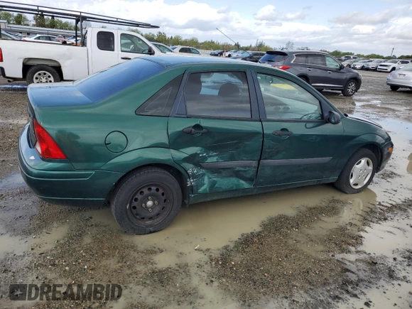 2001 Ford Focus LX with VIN 1FAFP33P91W363174, listed as a Copart auction lot 51299785 with 64,239 mi miles and Salvage Title. Bid and sale history available at carsss.com. Image 3.