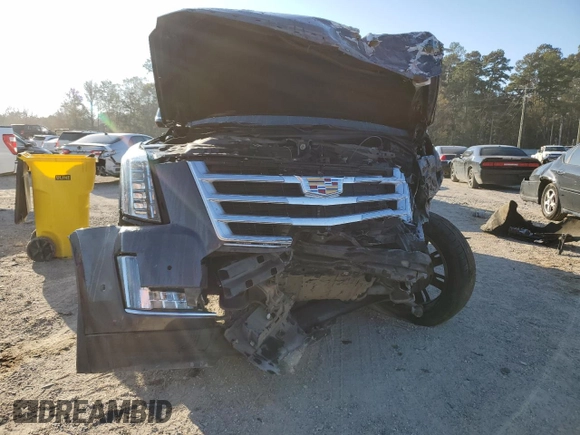 2018 Cadillac Escalade Luxury z VIN 1GYS3BKJXJR138217, wystawiony jako Copart lot #86212934 z przebiegiem Nie podano mil oraz Szkody całkowita. Historia ofert i sprzedaży dostępna na DreamBid. Obrazek 5.
