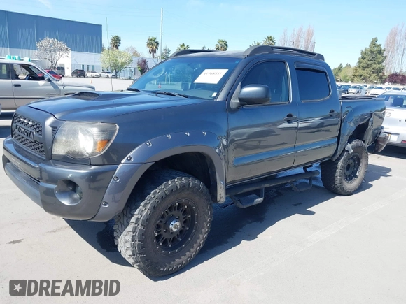 2010 Toyota Tacoma PreRunner with VIN 5TEJU4GN9AZ706709, listed as a IAAI auction lot 41968841 with 123,424 mi miles and . Bid and sale history available at DreamBid. Image 2.