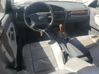 1998 BMW 3 Series 328iA with VIN WBACD4326WAV64466, listed as a Copart auction lot 74957534 with 152,963 mi miles and Salvage Title. Bid and sale history available at carsss.com. Image 8.