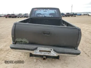 1994 GMC Sierra 1500 z VIN 2GTEK19K7R1531515, wystawiony jako Copart lot #45211685 z przebiegiem 286 840 mil mil oraz Szkoda całkowita • Salvage title. Historia ofert i sprzedaży dostępna na DreamBid. Obrazek 6.