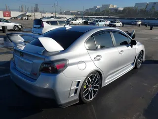 2021 Subaru WRX STI with VIN JF1VA2E66M9800482, listed as a IAAI auction lot 41331355 with 50,255 mi miles. Bid and sale history available at carsss.com. Image 4.