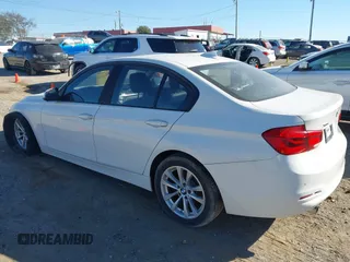 2016 BMW 3 Series 320i xDrive with VIN WBA8E5G51GNU21867, listed as a IAAI auction lot 40593300 with 99,044 mi miles and . Bid and sale history available at DreamBid. Image 3.