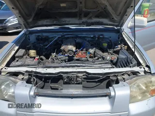 2001 Nissan Frontier SE Desert Runner z VIN 1N6ED26T51C362345, wystawiony jako IAAI lot #42324055 z przebiegiem 233 809 mil mil oraz . Historia ofert i sprzedaży dostępna na DreamBid. Obrazek 10.