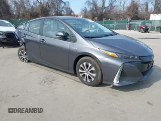 2022 Toyota Prius LE z VIN JTDKAMFP0N3220004, wystawiony jako IAAI lot #41725330 z przebiegiem 13 268 mil mil oraz . Historia ofert i sprzedaży dostępna na DreamBid. Obrazek 1.
