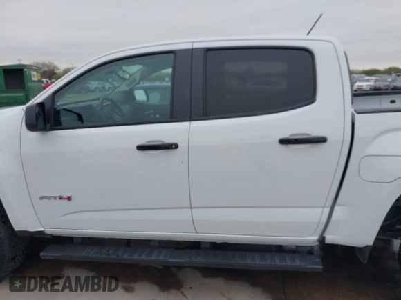 2021 GMC Canyon 4WD AT4 w/Leather with VIN 1GTG6FEN6M1154040, listed as a IAAI auction lot 41209527 with 29,484 mi miles. Bid and sale history available at carsss.com. Image 14.