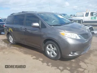 2011 Toyota Sienna LE AAS with VIN 5TDKK3DC4BS044382, listed as a IAAI auction lot 39280364 with 104,262 mi miles. Bid and sale history available at carsss.com. Image 1.