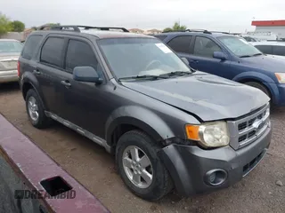 2009 Ford Escape XLS with VIN 1FMCU92769KD15656, listed as a IAAI auction lot 42185560 with 110,792 mi miles and . Bid and sale history available at DreamBid. Image 1.