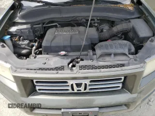 2006 Honda Ridgeline RTS z VIN 2HJYK16476H544699, wystawiony jako Copart lot #53528725 z przebiegiem 225 881 mil mil oraz Szkoda całkowita • Salvage title. Historia ofert i sprzedaży dostępna na DreamBid. Obrazek 11.