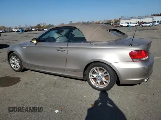 2008 BMW 1 Series 128i with VIN WBAUN13568VH80214, listed as a Copart auction lot 77264334 with 98,400 mi miles and Clean Title. Bid and sale history available at DreamBid. Image 2.