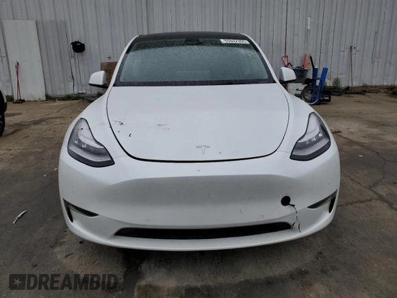 2022 Tesla Model Y Long Range z VIN 7SAYGDEE5NA016276, wystawiony jako Copart lot #55942355 z przebiegiem 14 085 mil mil oraz Szkody całkowita. Historia ofert i sprzedaży dostępna na DreamBid. Obrazek 5.