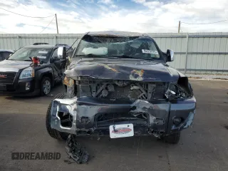 2013 Nissan Titan Pro-4X with VIN 1N6BA0EC2DN305708, listed as a Copart auction lot 45329275 with 68,636 mi miles and Salvage title. Bid and sale history available at DreamBid. Image 5.