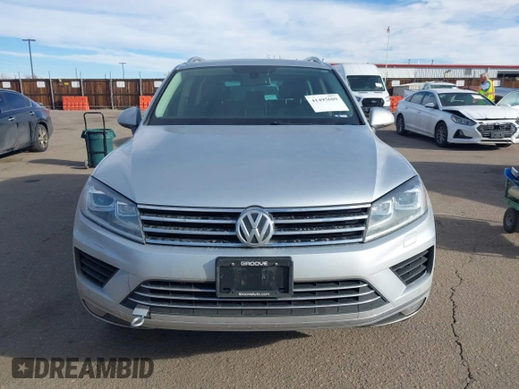 2015 Volkswagen Touareg Lux с VIN WVGEP9BP2FD001793, выставлен на аукционе IAAI как лот 41495609 с пробегом 138 239 миль миль и . История ставок и продаж доступна на DreamBid. Изображение 12.
