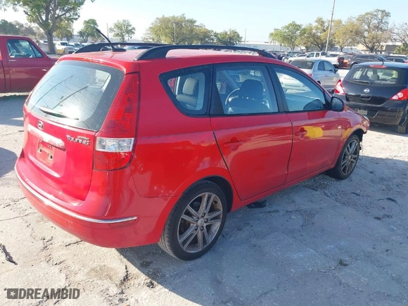 2010 Hyundai Elantra Touring SE with VIN KMHDC8AE8AU070112, listed as a IAAI auction lot 41803426 with 117,816 mi miles. Bid and sale history available at carsss.com. Image 4.