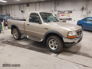 1999 Ford Ranger XLT with VIN 1FTYR11X0XTA72917, listed as a IAAI auction lot 41502156 with 106,585 mi miles. Bid and sale history available at carsss.com. Image 1.