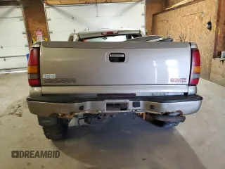 2003 GMC Sierra Denali z VIN 2GTFK69U531264188, wystawiony jako Copart lot #70624354 z przebiegiem Nie podano mil oraz Szkody całkowita. Historia ofert i sprzedaży dostępna na DreamBid. Obrazek 6.