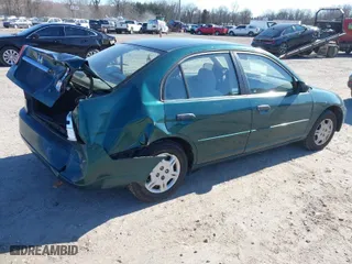 2001 Honda Civic LX with VIN 2HGES16551H567764, listed as a IAAI auction lot 41908288 with 137,740 mi miles. Bid and sale history available at carsss.com. Image 4.