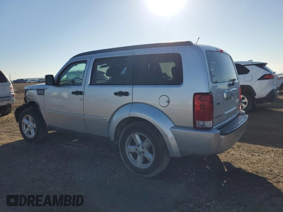 2010 Dodge Nitro SXT z VIN 1D4PT5GK5AW106990, wystawiony jako Copart lot #88719415 z przebiegiem 193 019 mil mil oraz Szkoda całkowita • Salvage title. Historia ofert i sprzedaży dostępna na DreamBid. Obrazek 2.