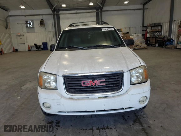 2003 GMC Envoy SLT with VIN 1GKES16S436240107, listed as a Copart auction lot 52327005 with 237,745 mi miles and Clean Title. Bid and sale history available at carsss.com. Image 5.