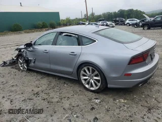 2016 Audi A7 3.0 Prestige with VIN WAU2GAFC0GN013403, listed as a Copart auction lot 62996203 with 150,003 mi miles. Bid and sale history available at carsss.com. Image 2.